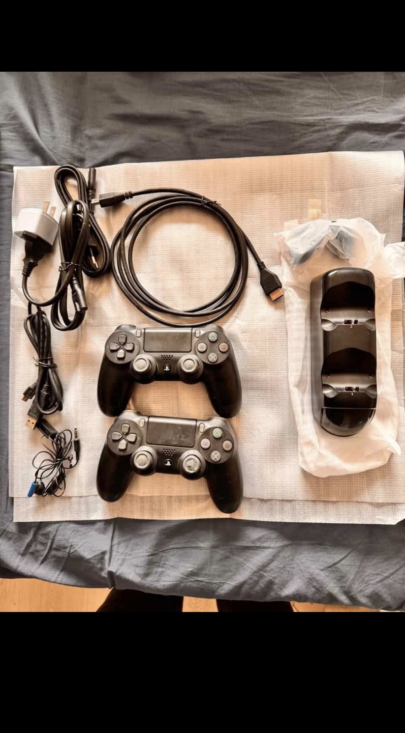 PS4 Slim Console Bundle - 2 Controllers, Games & More!