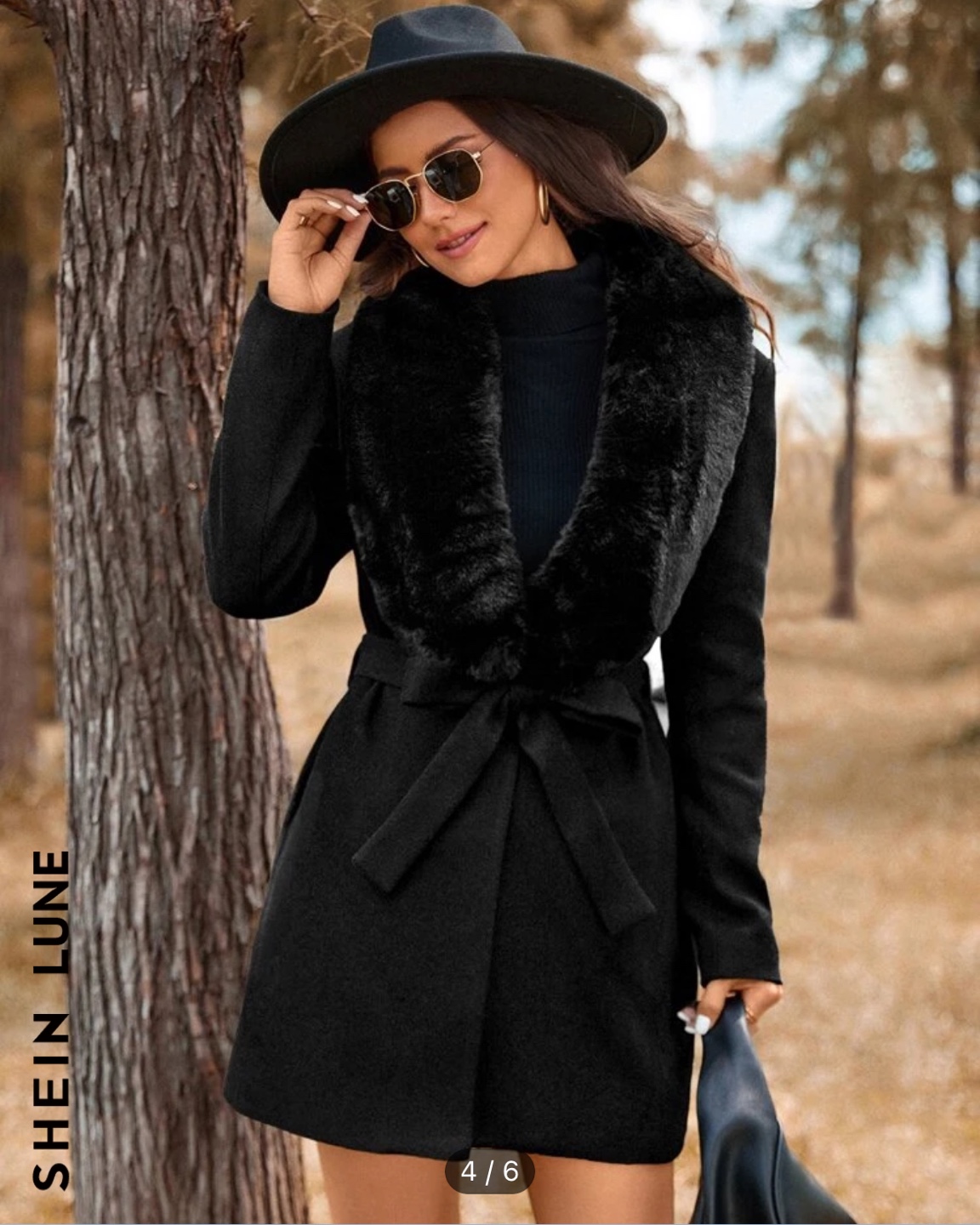 Black belted coat with faux fur collar