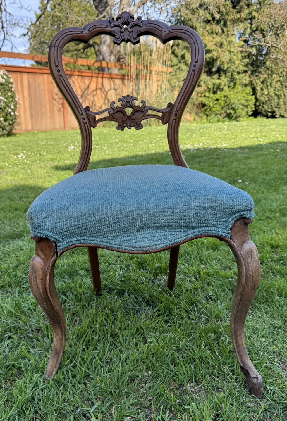 Antique Carved Wood Chair with Teal Upholstery