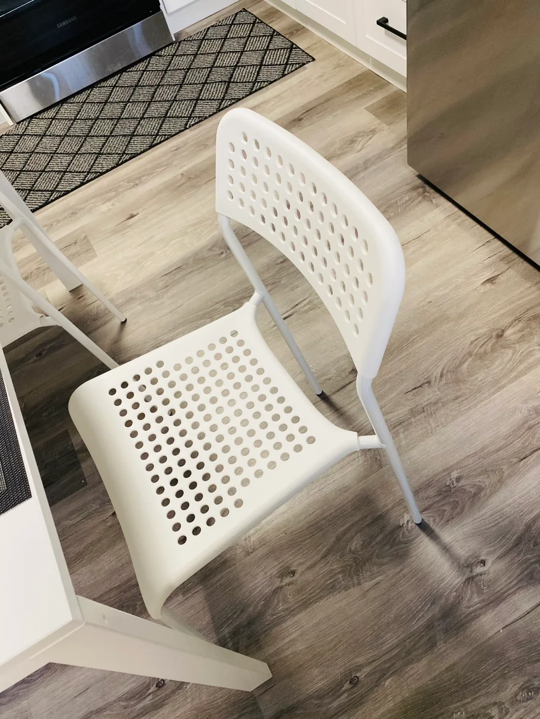 White Dining Table Set with Four Chairs image indicator(3)