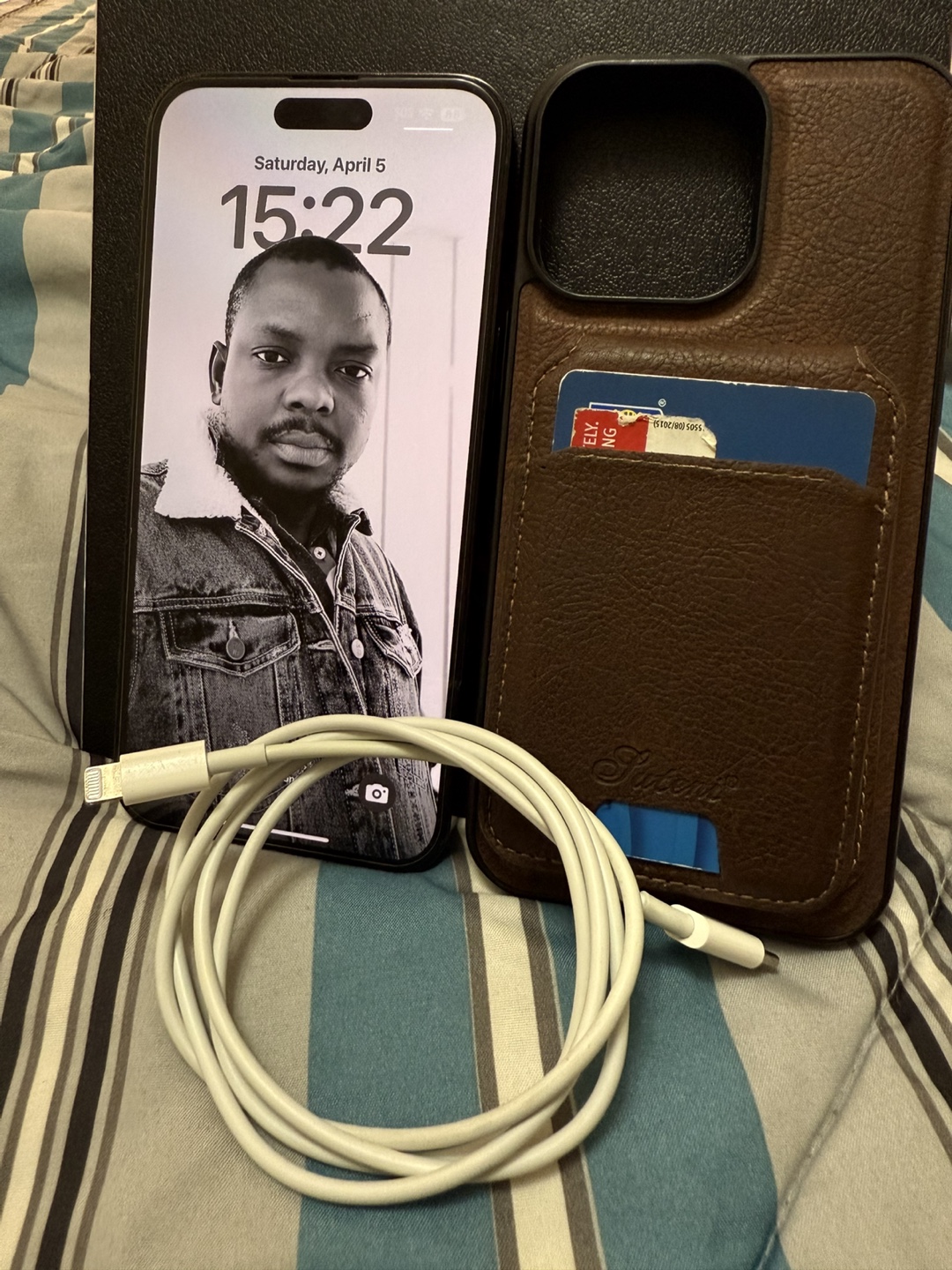 iPhone 14 Pro Max with Case and Cable