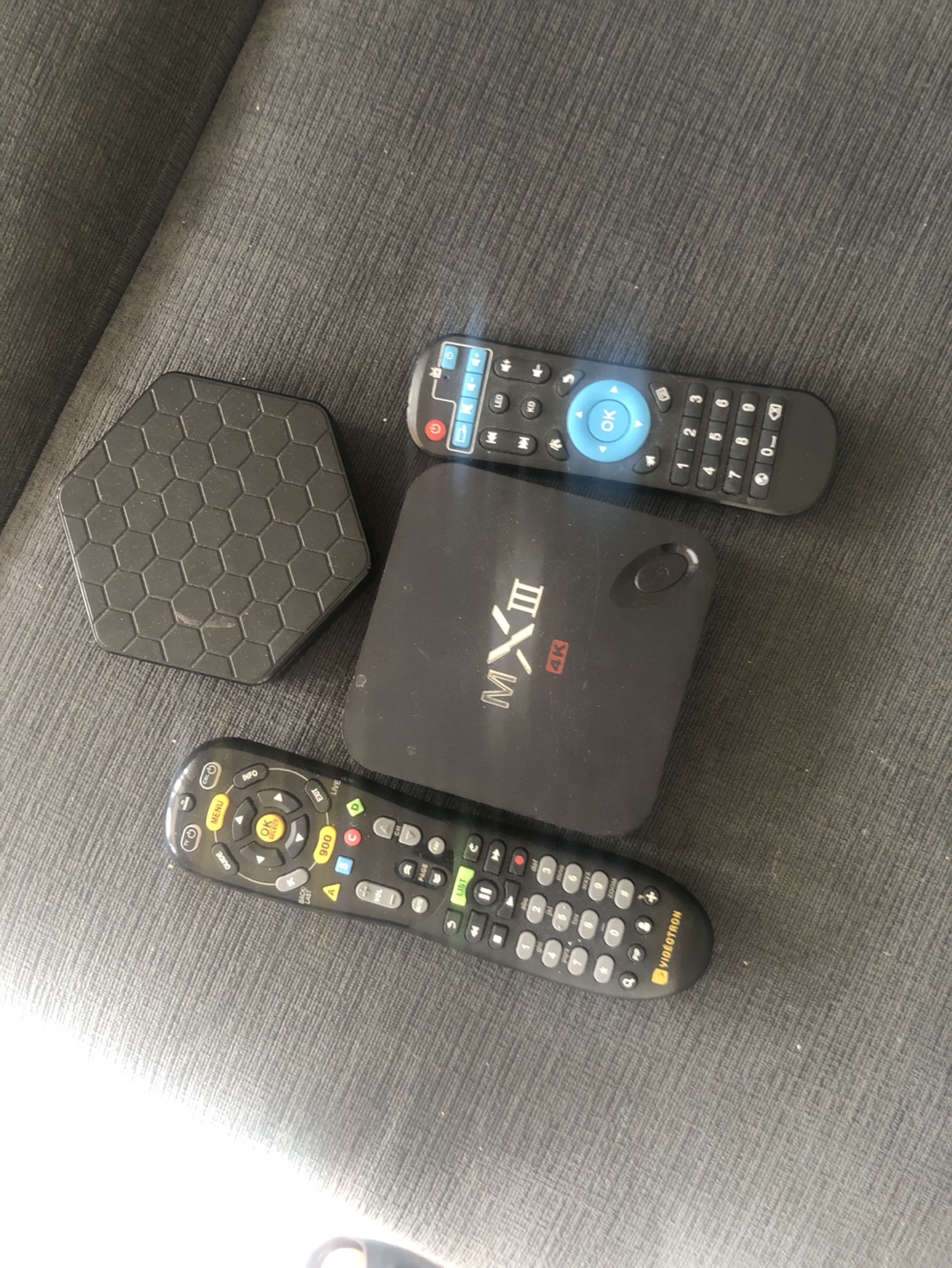 2 TV boxes with remotes