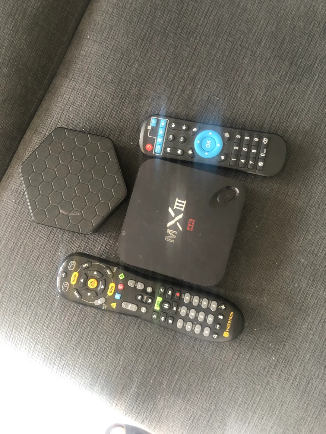 2 TV boxes with remotes thumbnail