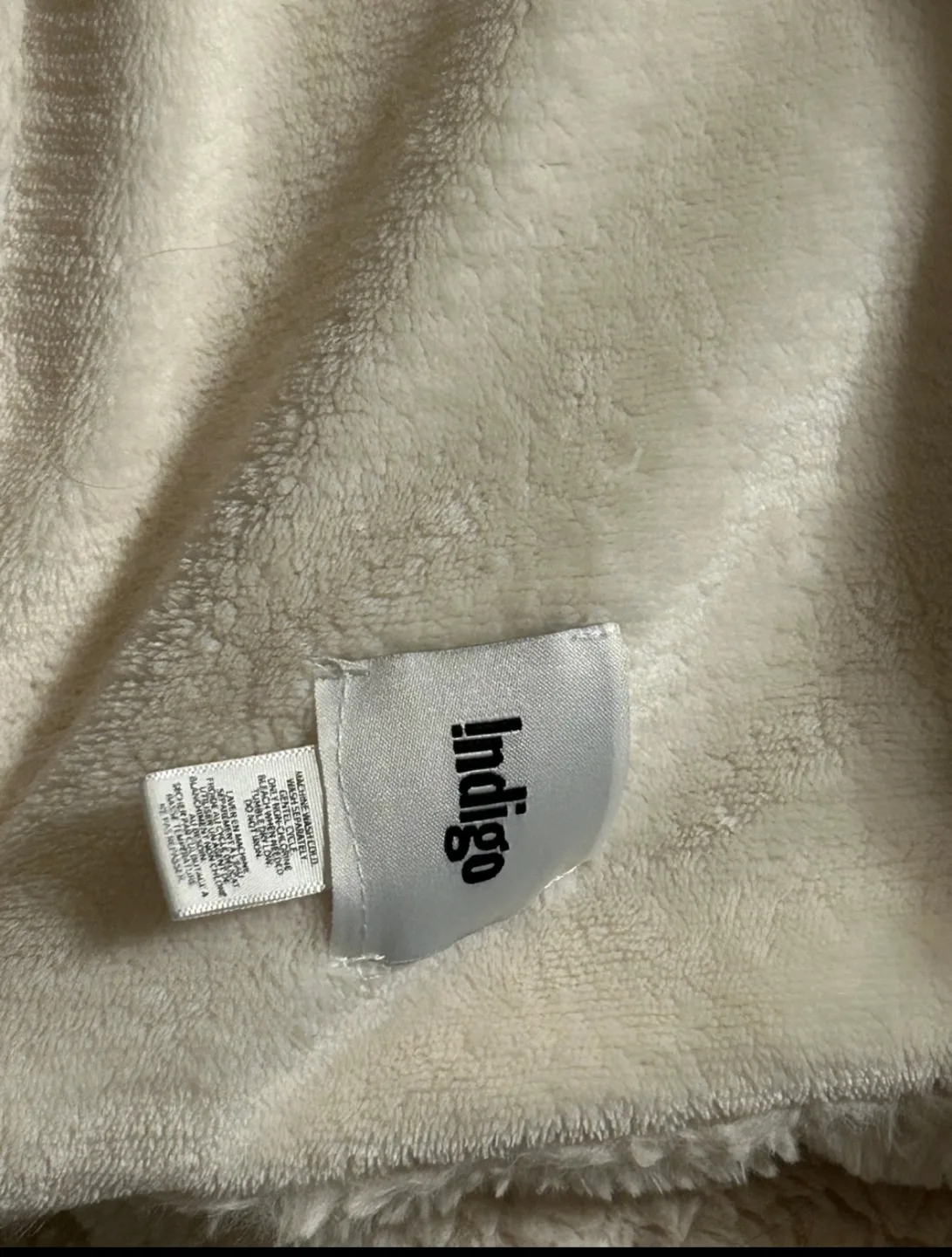 Cream-coloured Indigo faux Throw Blanket image indicator(2)