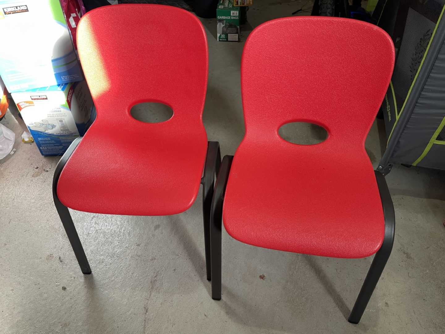 Pair of red children's chairs and table