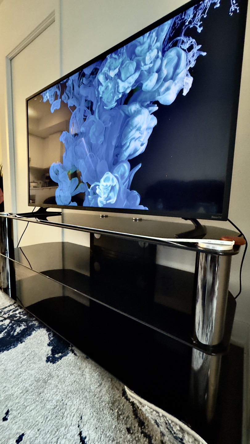 50 inch Insignia Roku TV with 55 inch sturdy TV Stand