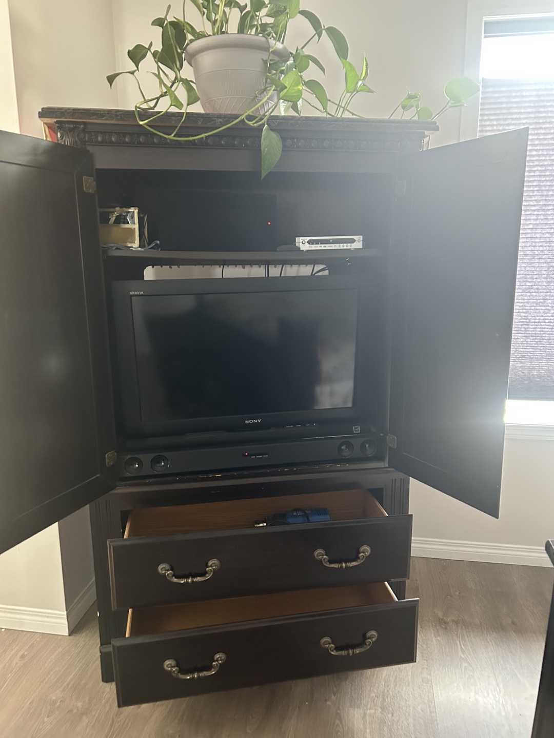 Dark Brown Wooden Armoire with Doors and Drawers