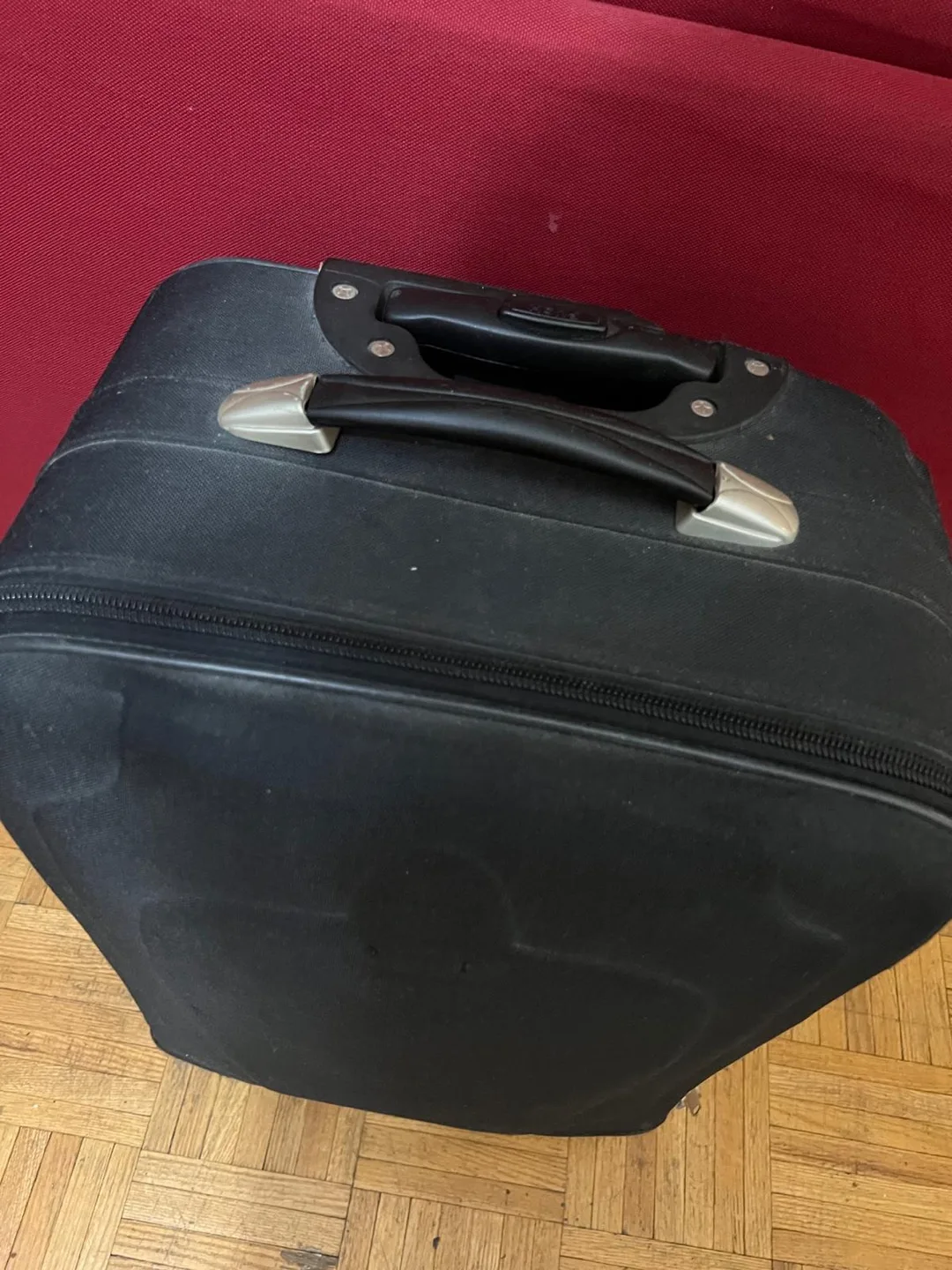Black Carry-on Suitcase with Wheels image indicator(3)