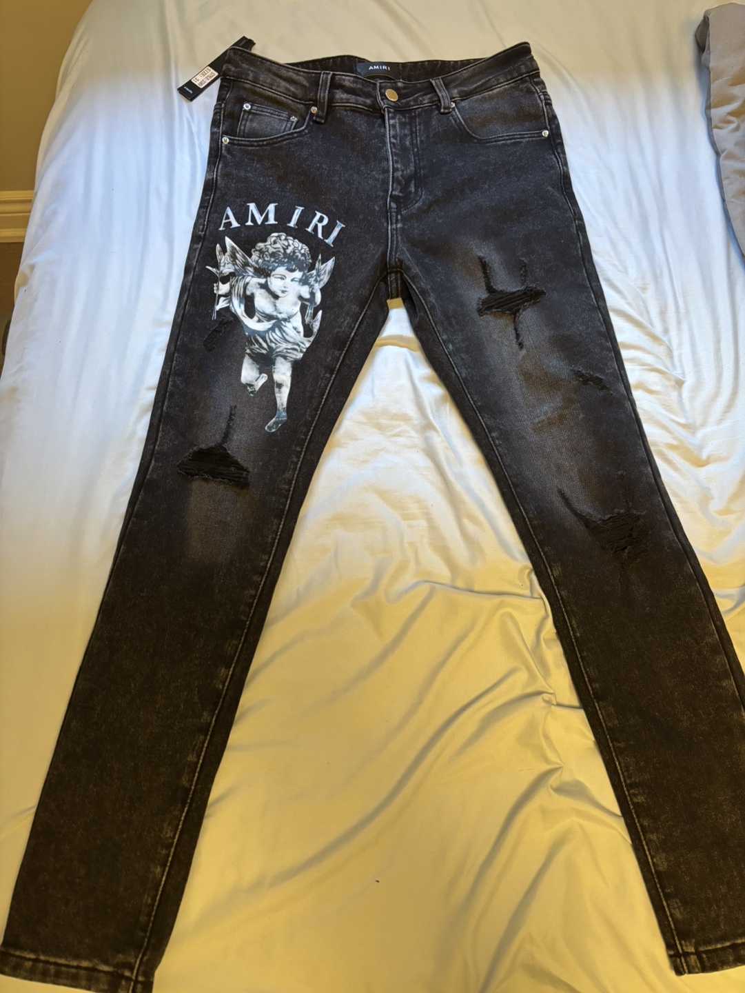 black amiri jeans