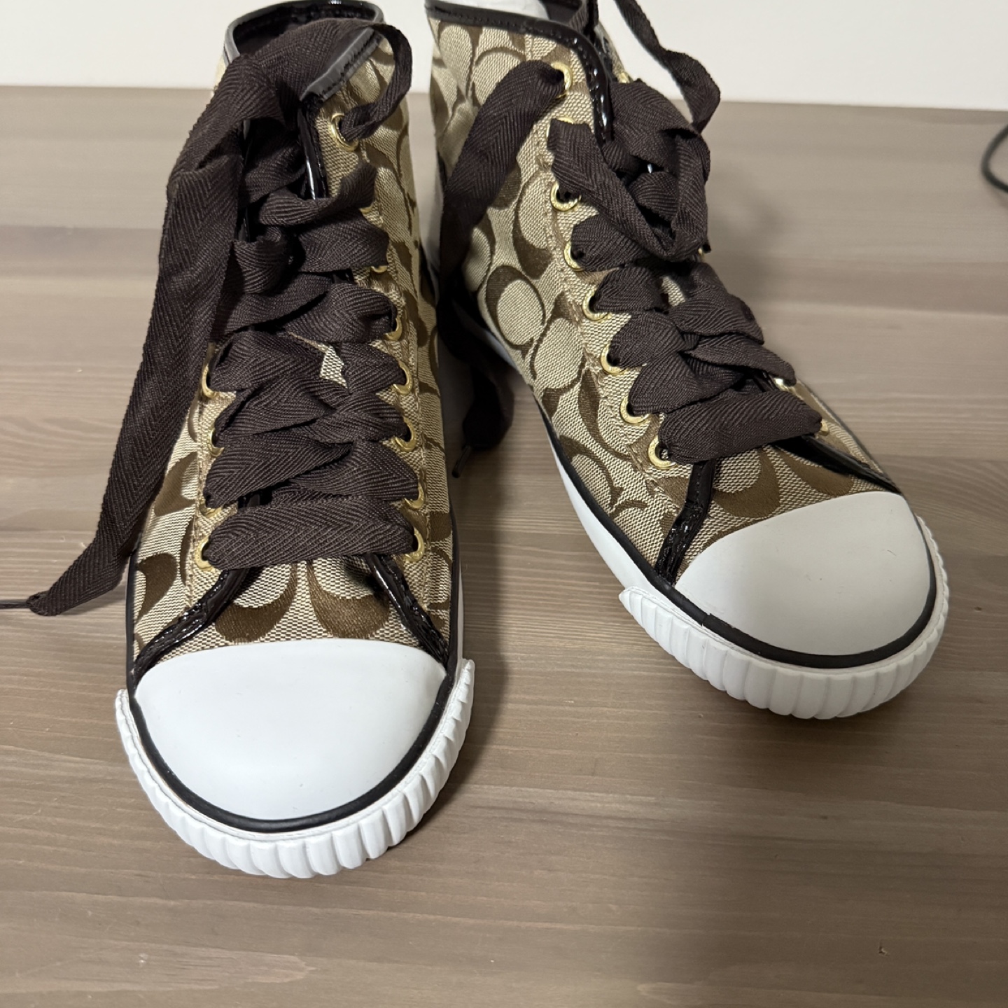 Women's Black and Gold High Heels and Coach High Top Sneakers - photo 2