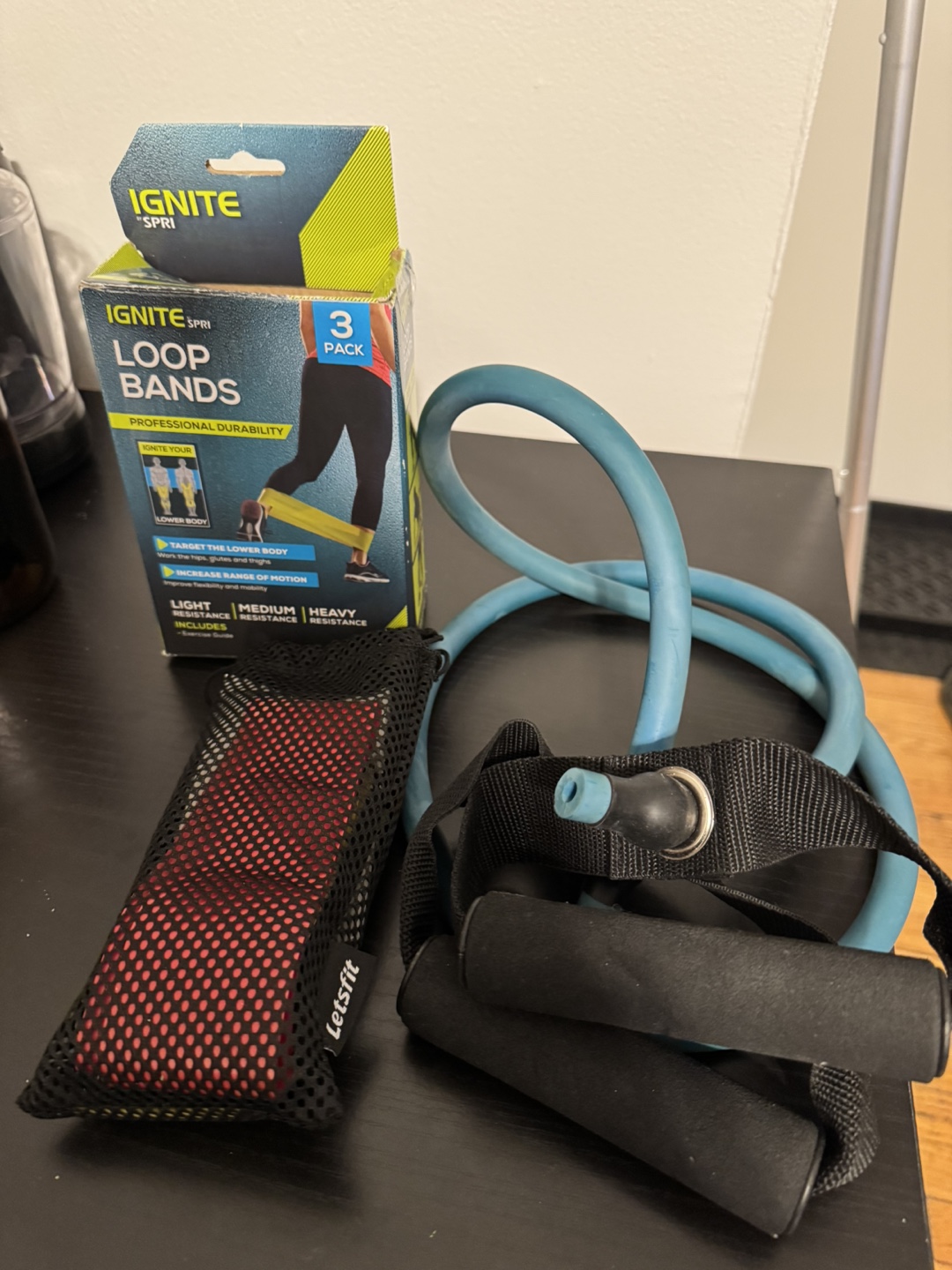 Assorted Exercise Bands and Workout Items