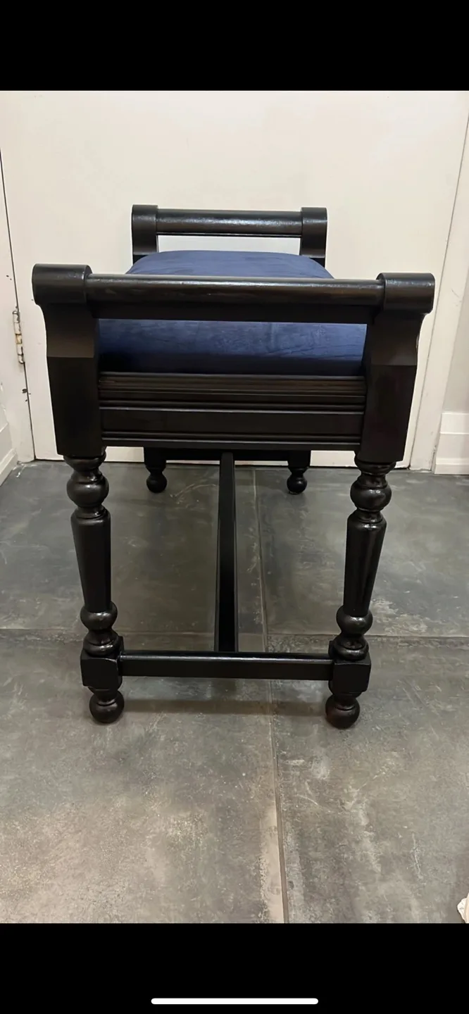 Dark wood bench with navy blue velvet cushion image indicator(3)