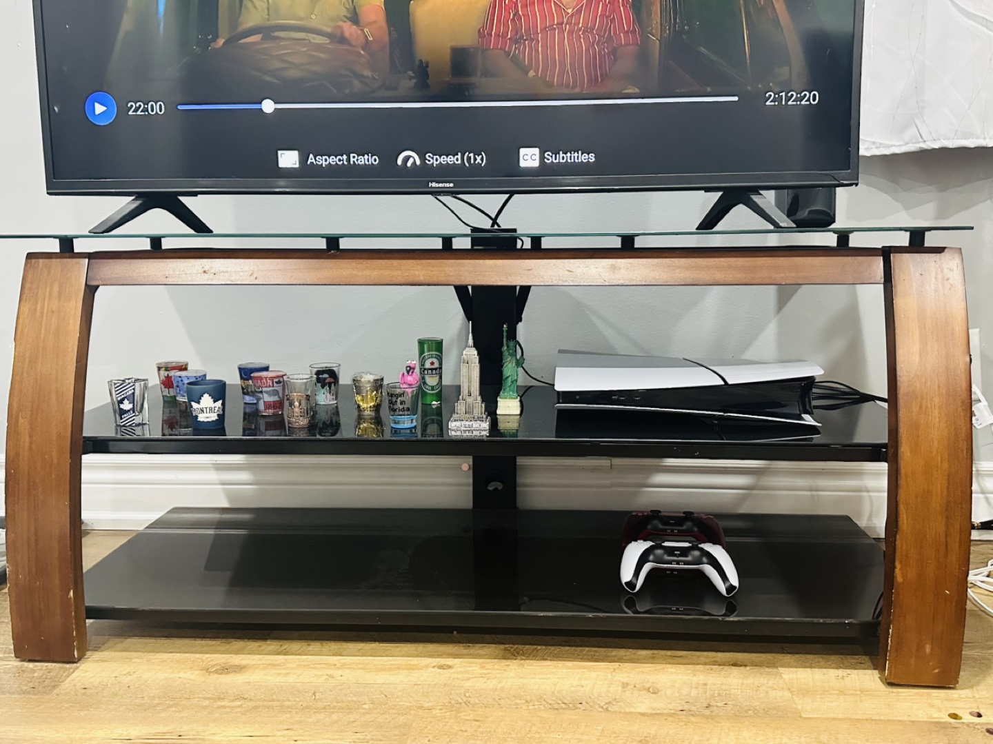 Two-tier TV stand with glass shelves