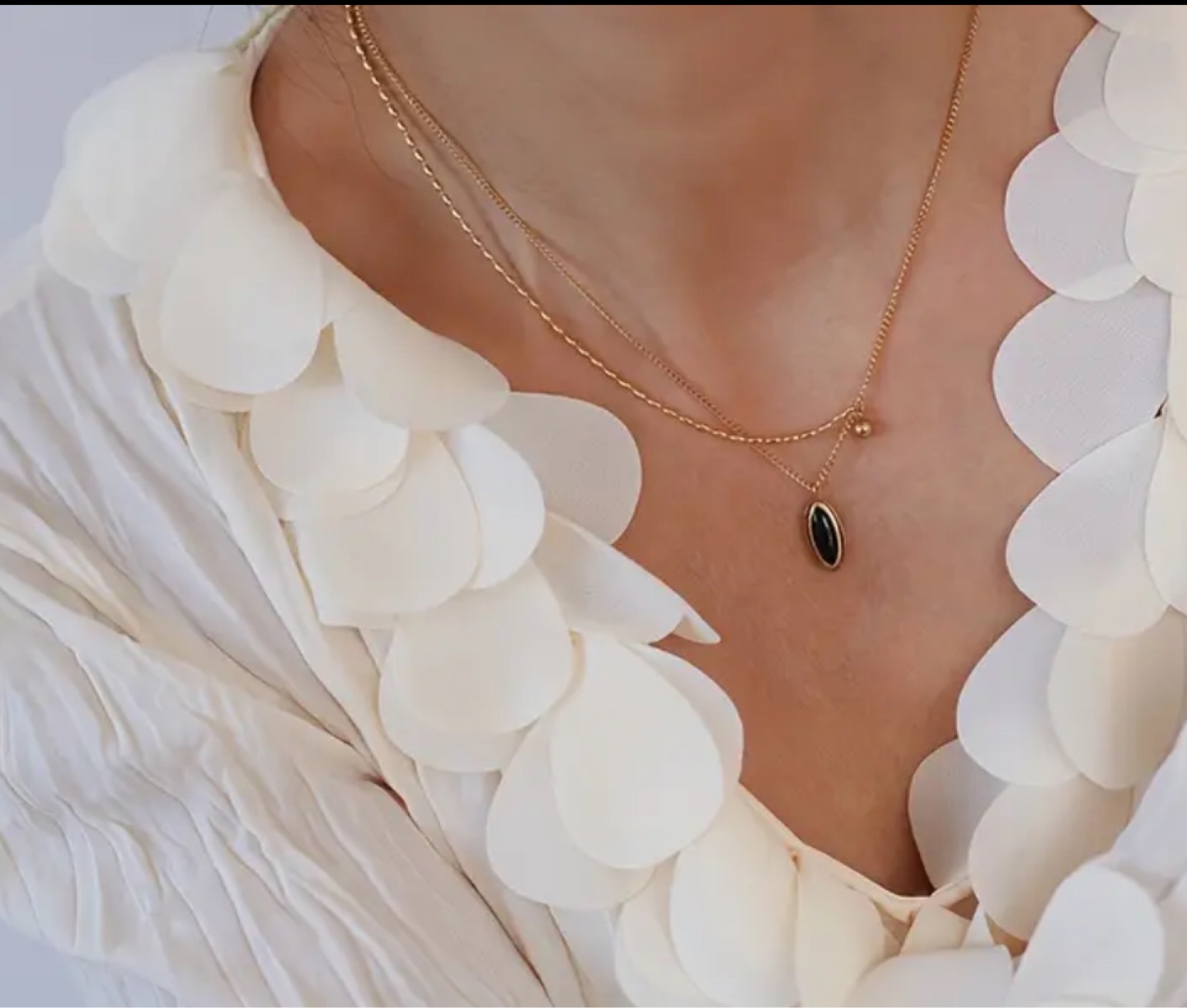 Delicate Gold Layered Necklace with Black Oval Pendant - photo 2