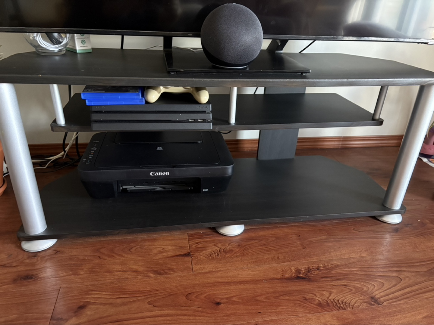 Black TV Stand with Silver Legs