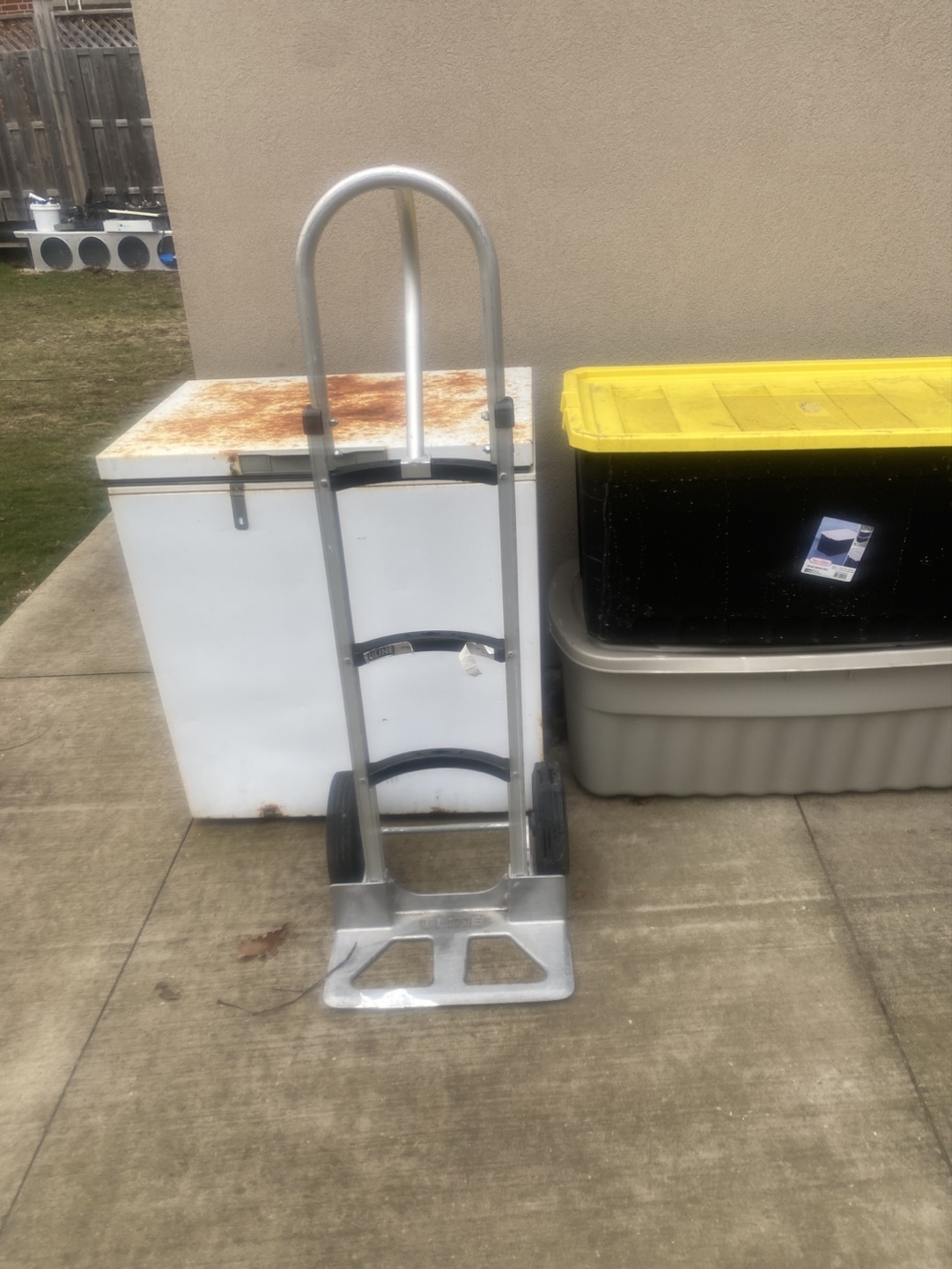 Outdoor Patio Set: Chairs, Table, BBQ, and Hand Truck