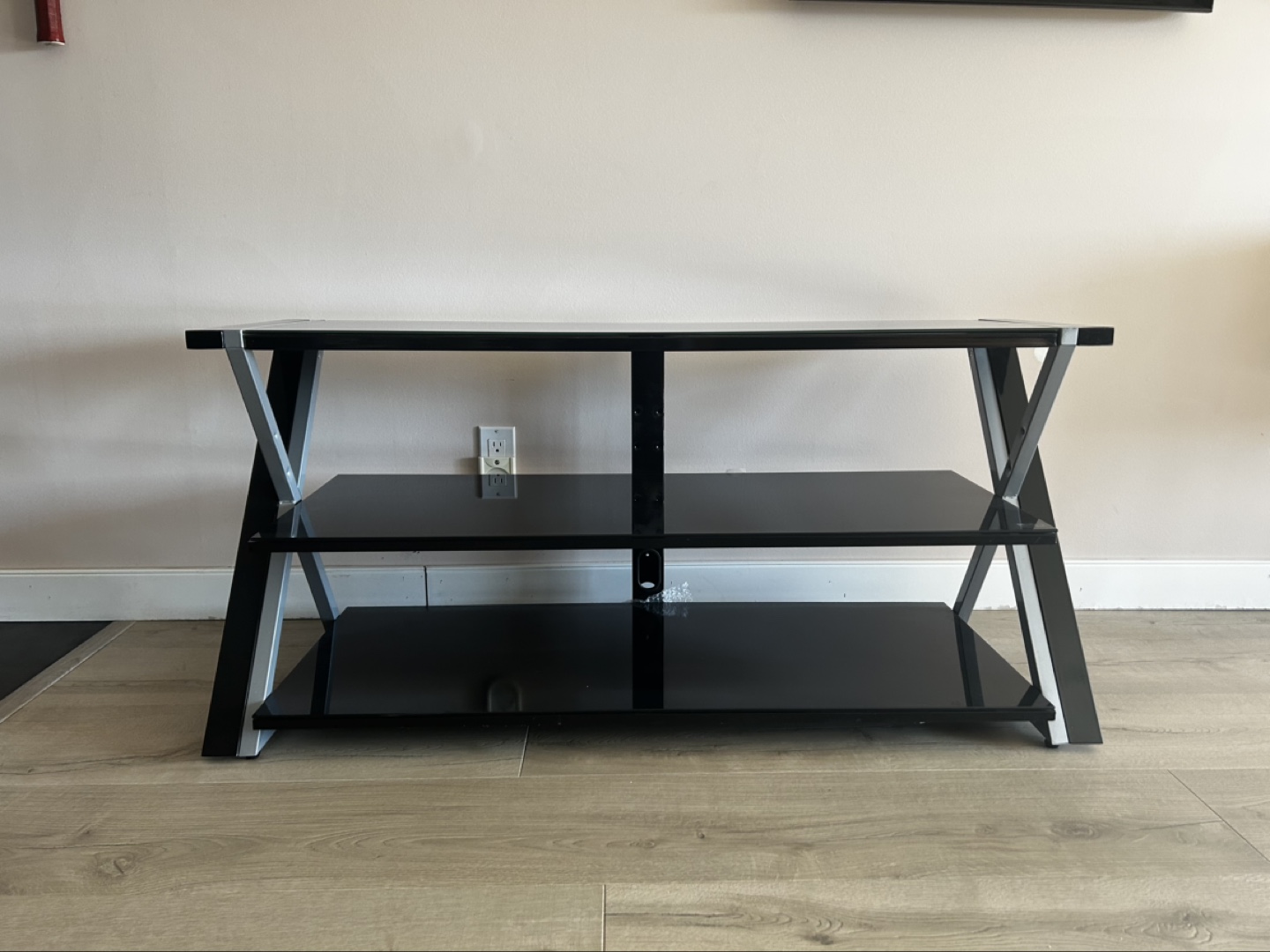 Black Glass TV Stand with Silver Accents