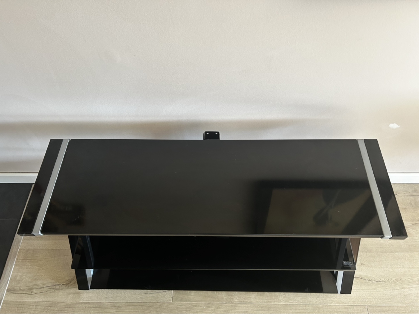 Black Glass TV Stand with Silver Accents - photo 3