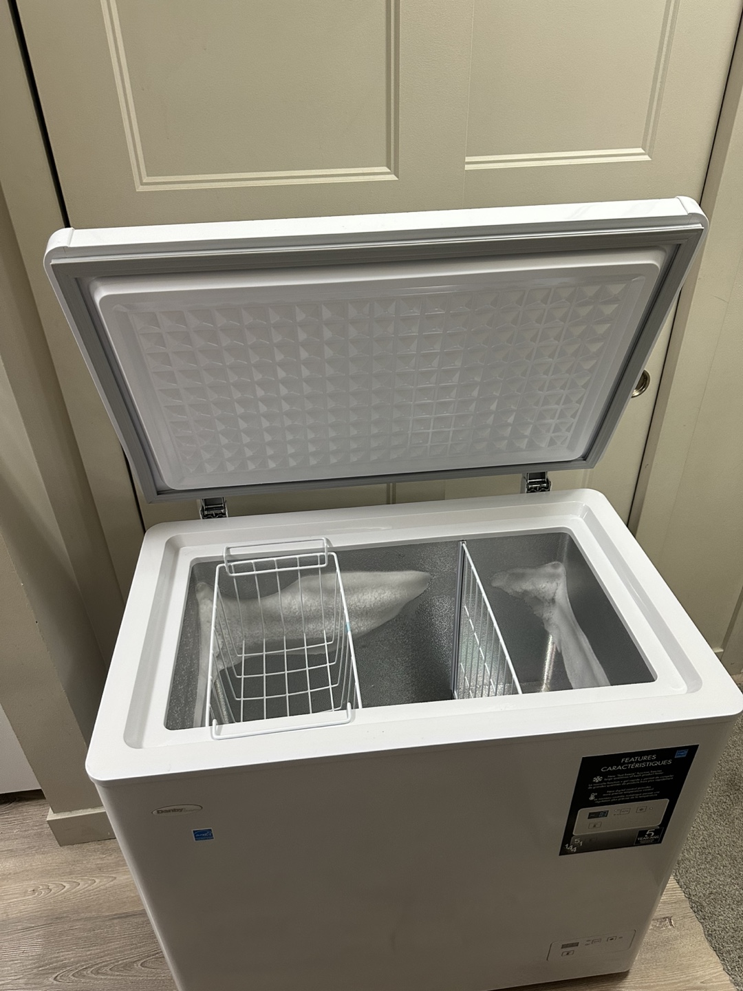 Essentially a like-new Danby apartment-size freezer.