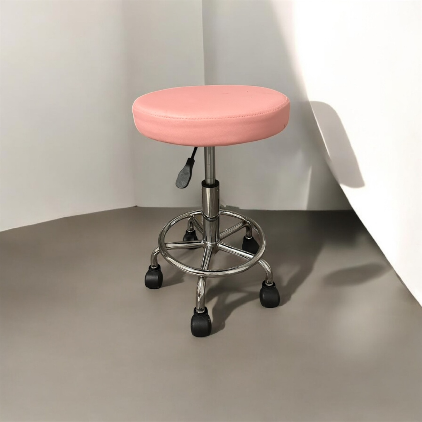 Pink Rolling Salon Stool