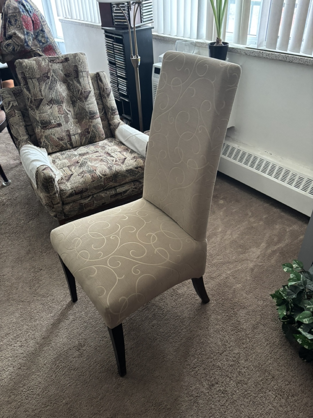 4 Beige Dining Chairs with Swirl Pattern