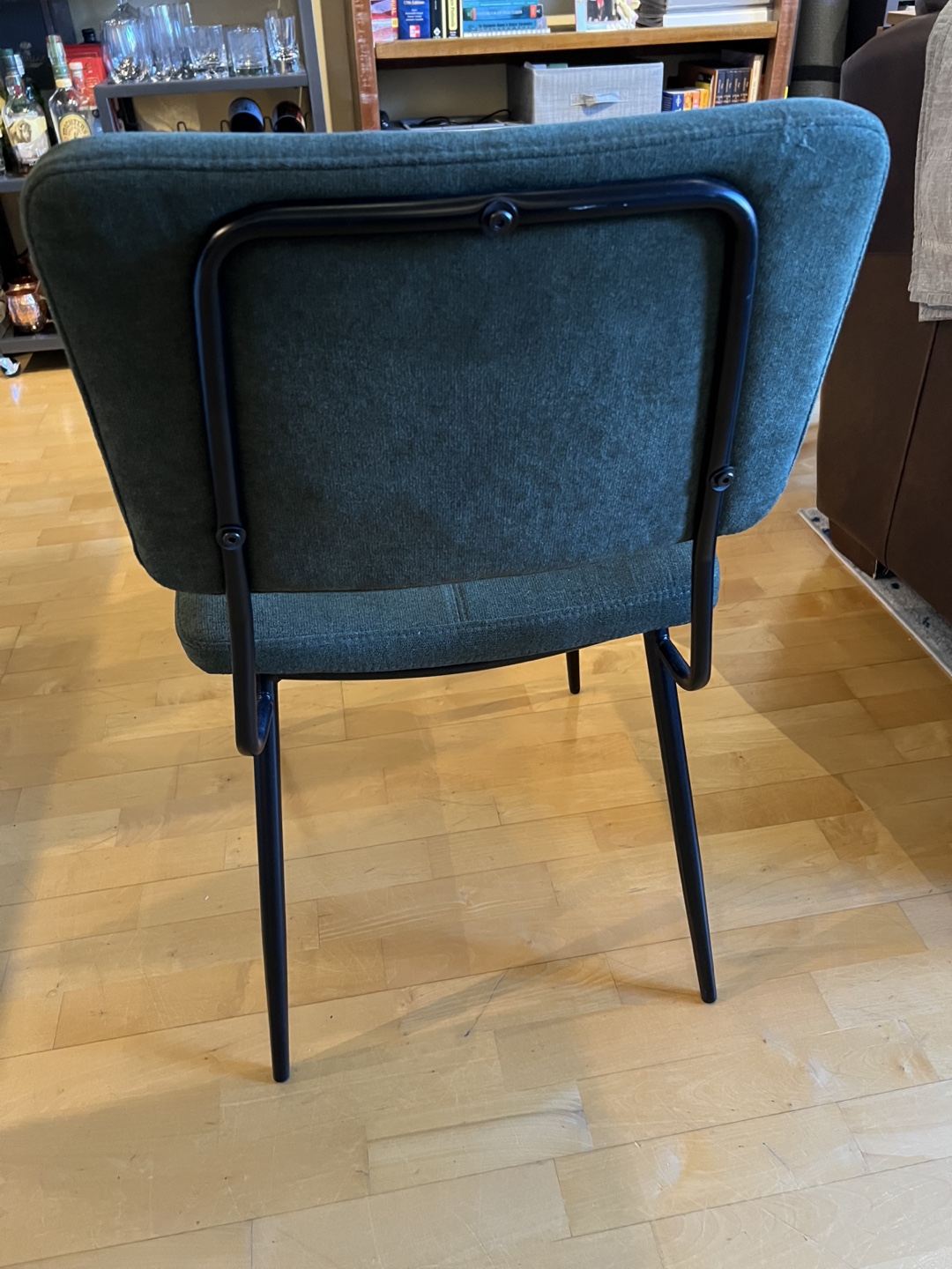 Four Dark Green Upholstered Dining Chairs with Black Metal Legs - photo 4