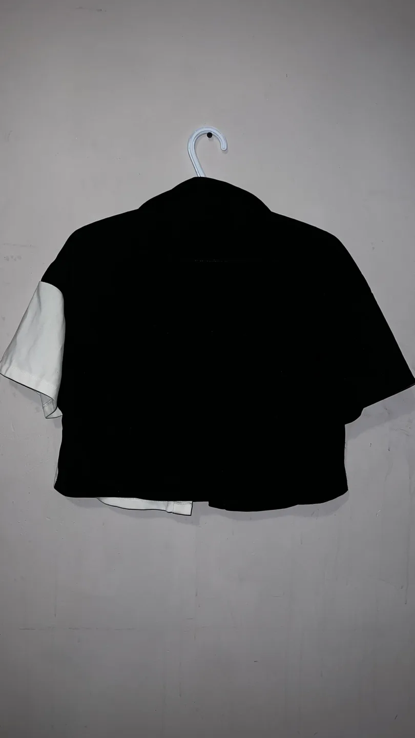 Two-toned black and white cropped button-up shirt and skirt image indicator(3)