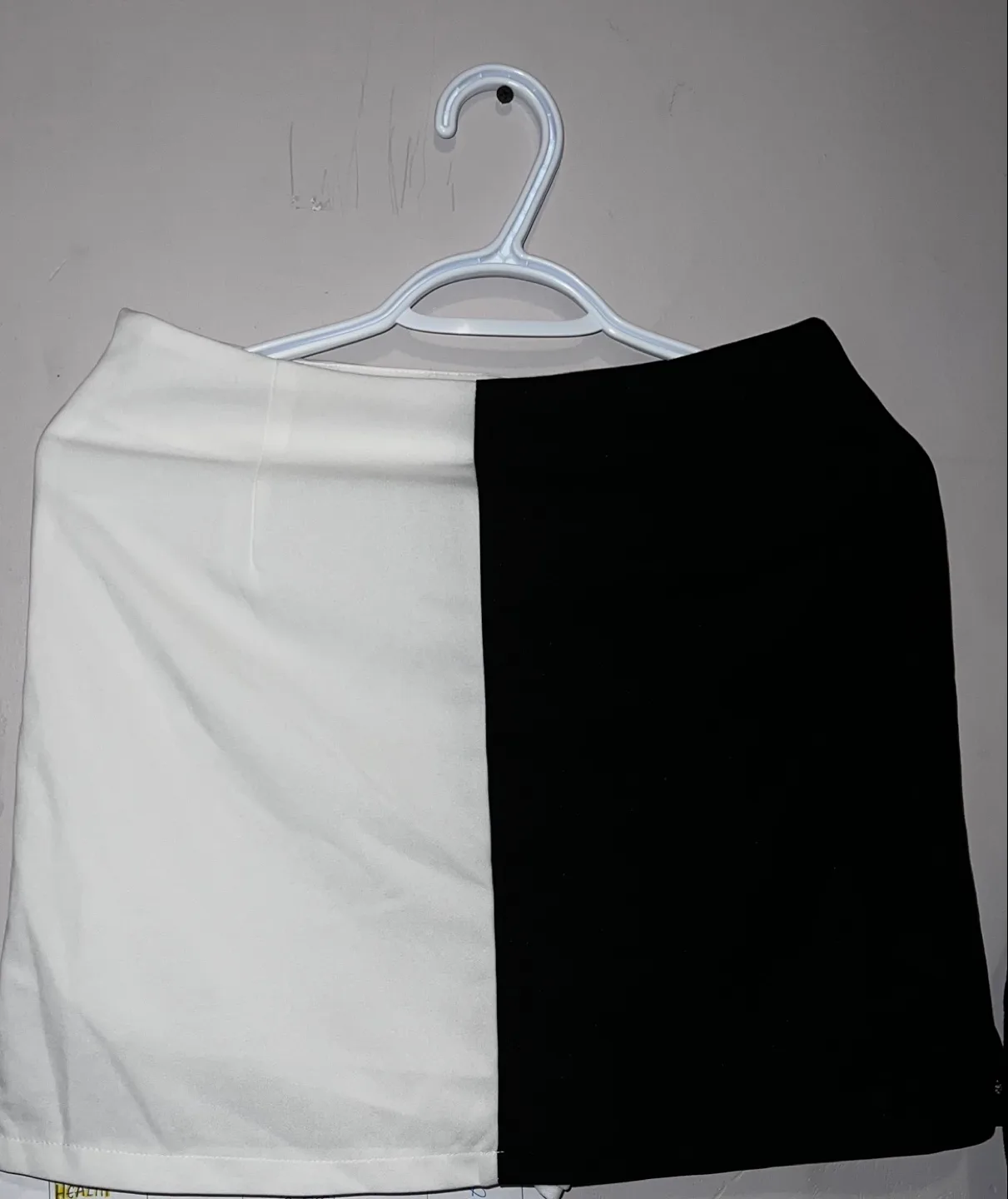 Two-toned black and white cropped button-up shirt and skirt image indicator(4)