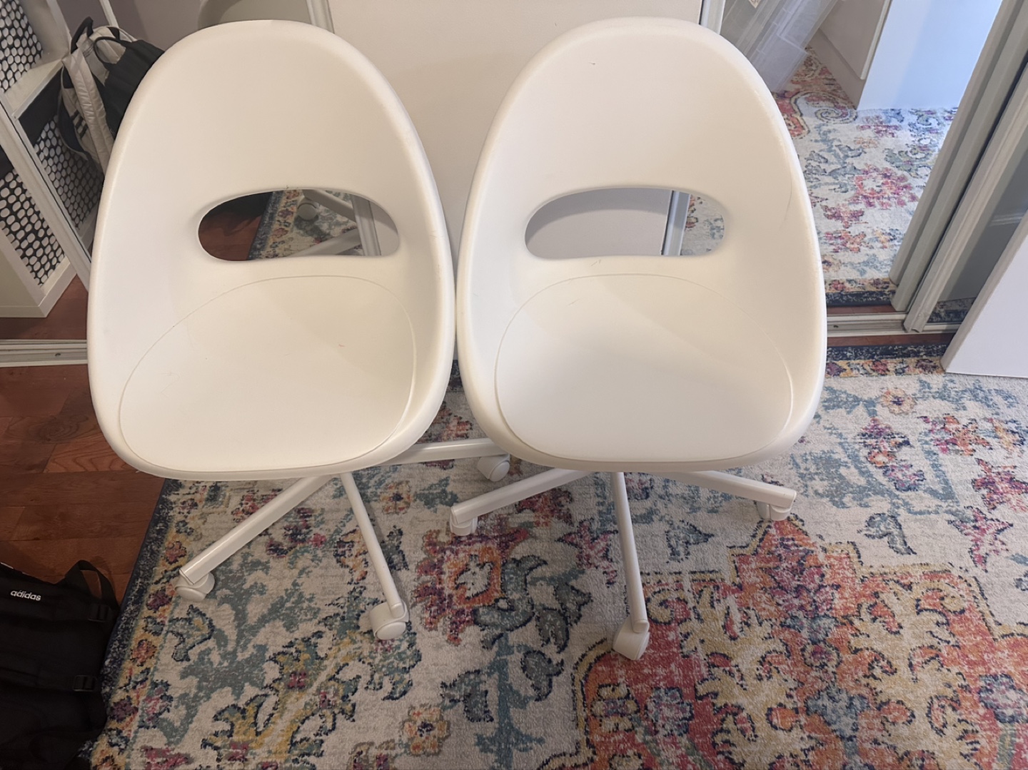 Pair of White Swivel Chairs