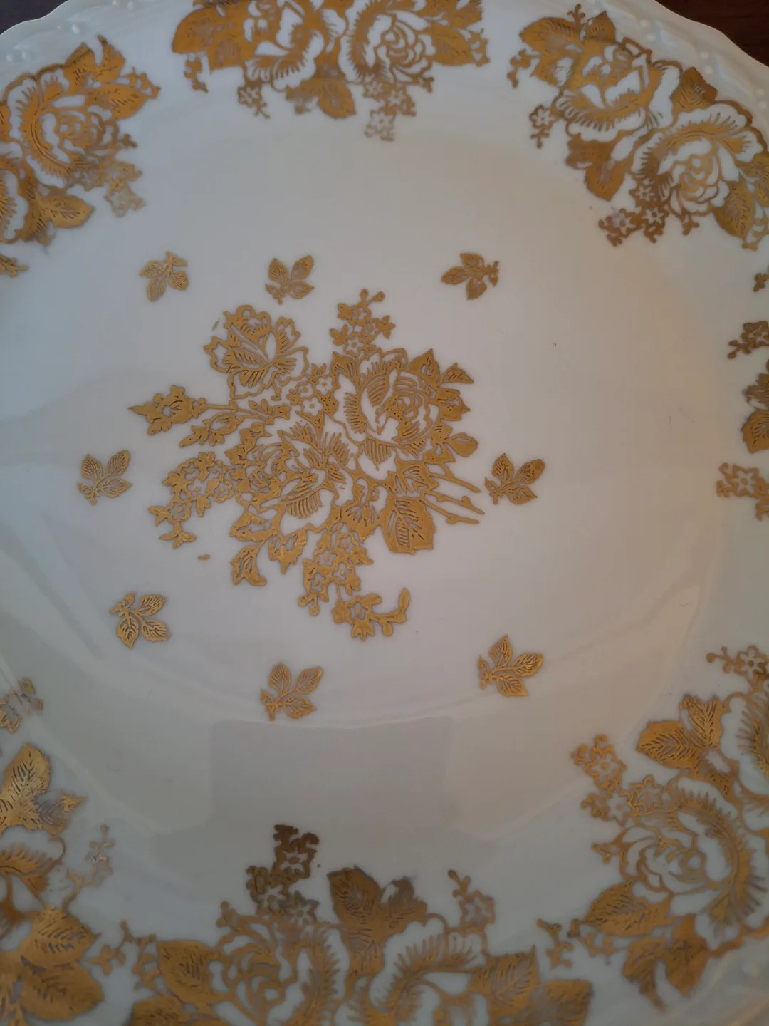 Hand-painted porcelain plate with gold flowers image indicator(2)