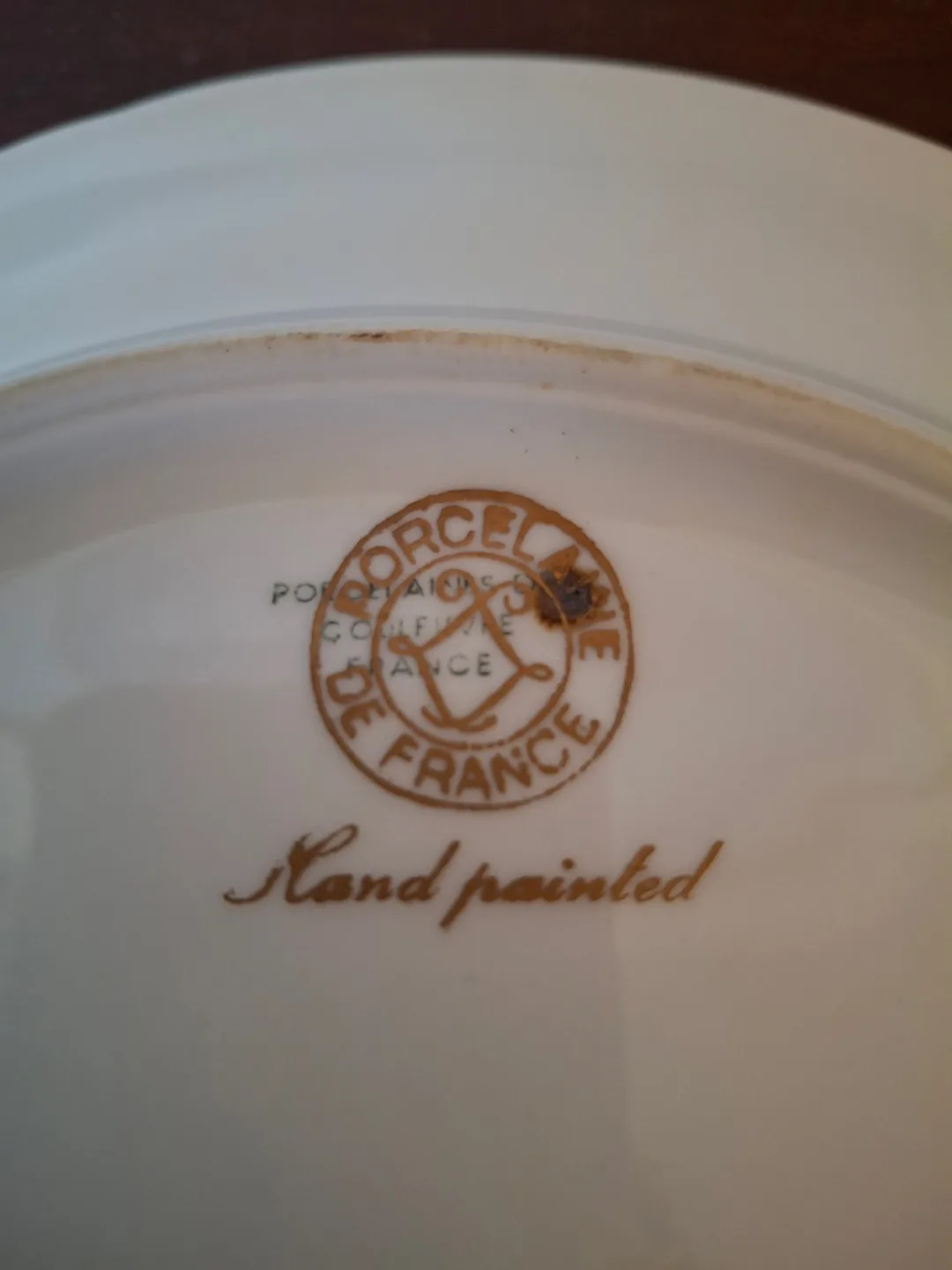 Hand-painted porcelain plate with gold flowers image indicator(3)