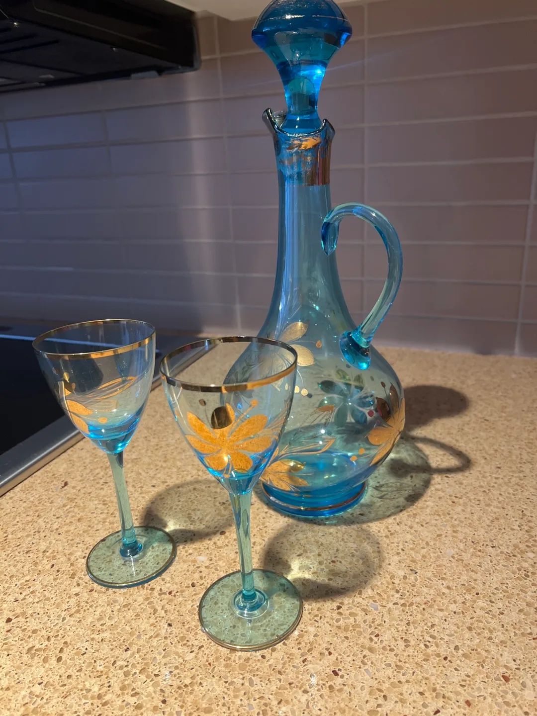Set of Vintage Blue Glass Liquor Decanter with Gold Accents image indicator(3)