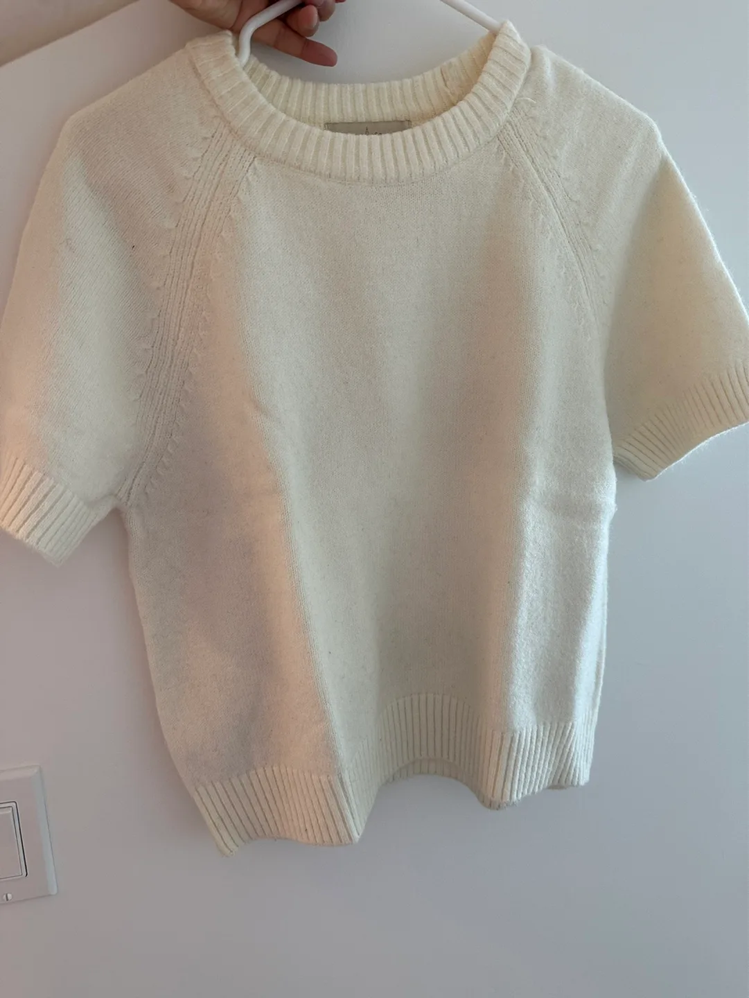White sweater thumbnail