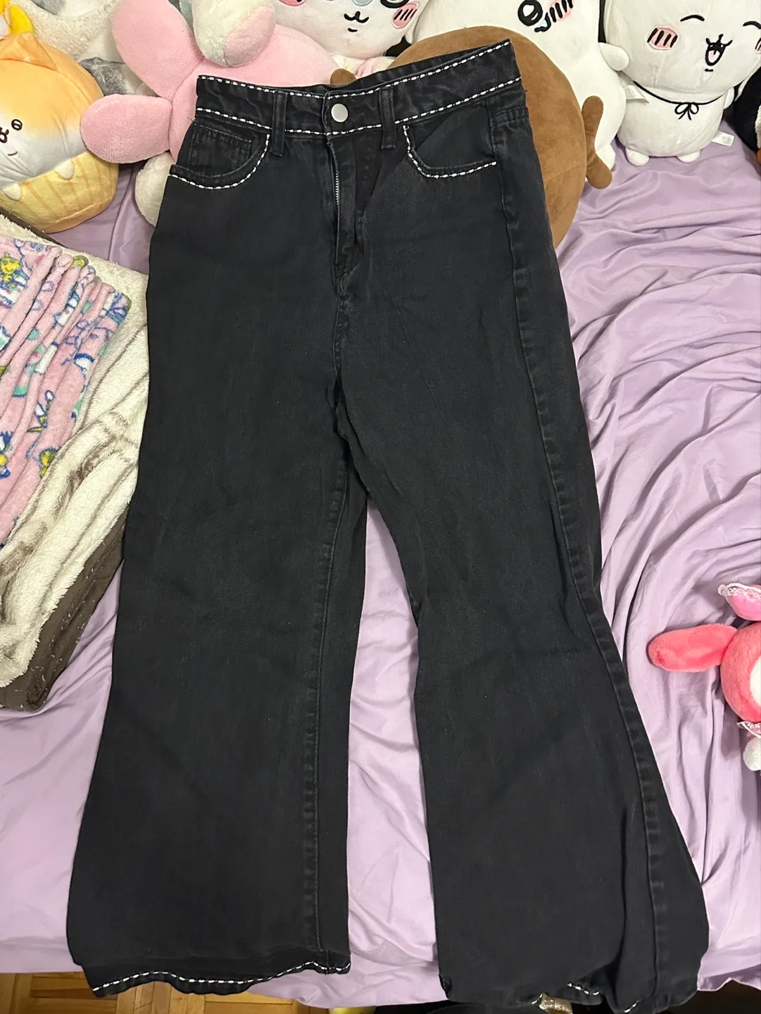 Black embroidered flare jeans image indicator(2)