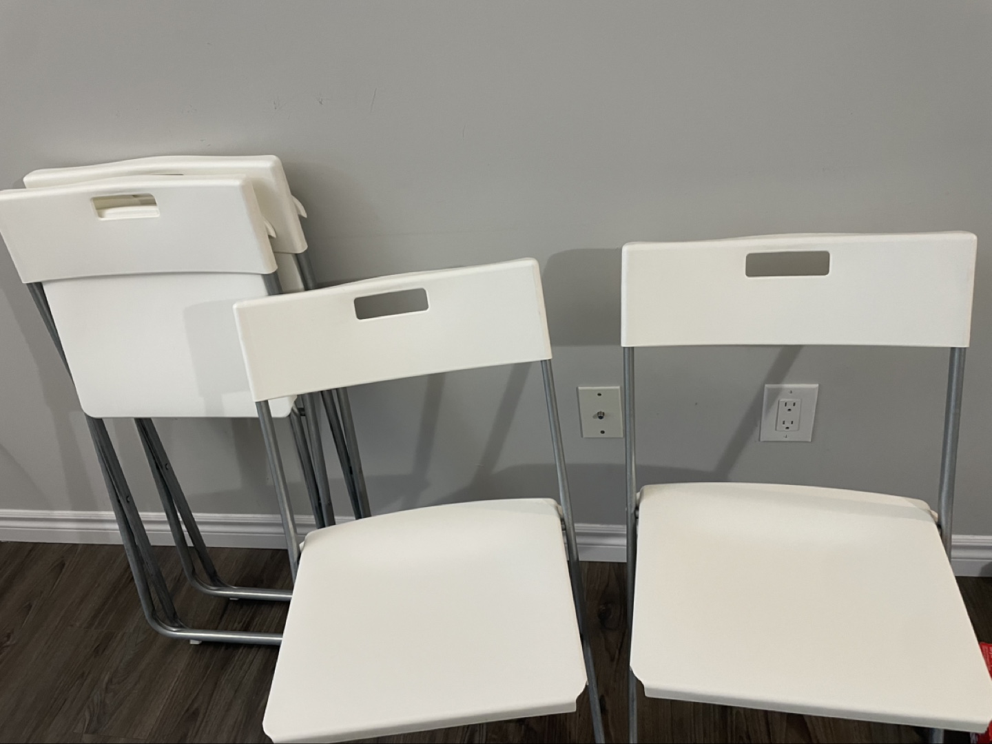 (Urgent)Set of three white folding chairs