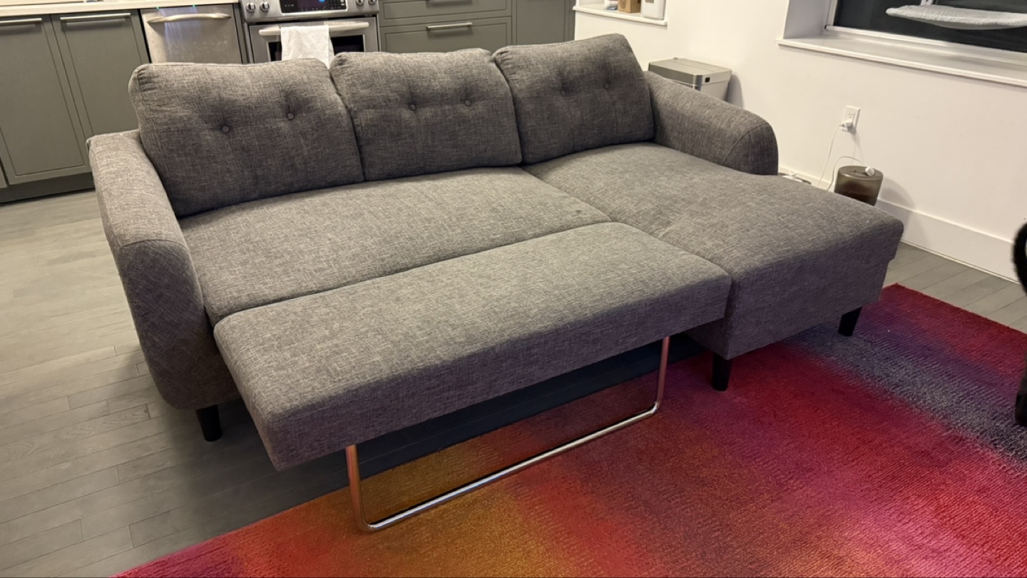 Gray Sectional Sofa with Pull-Out Ottoman