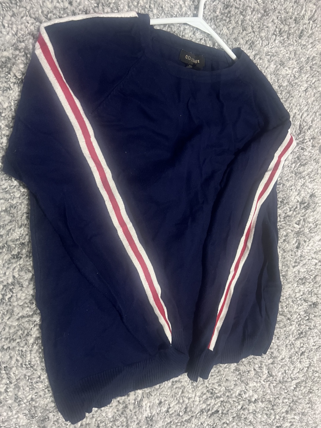 Declutter sales - Navy blue sweater with red and white stripes