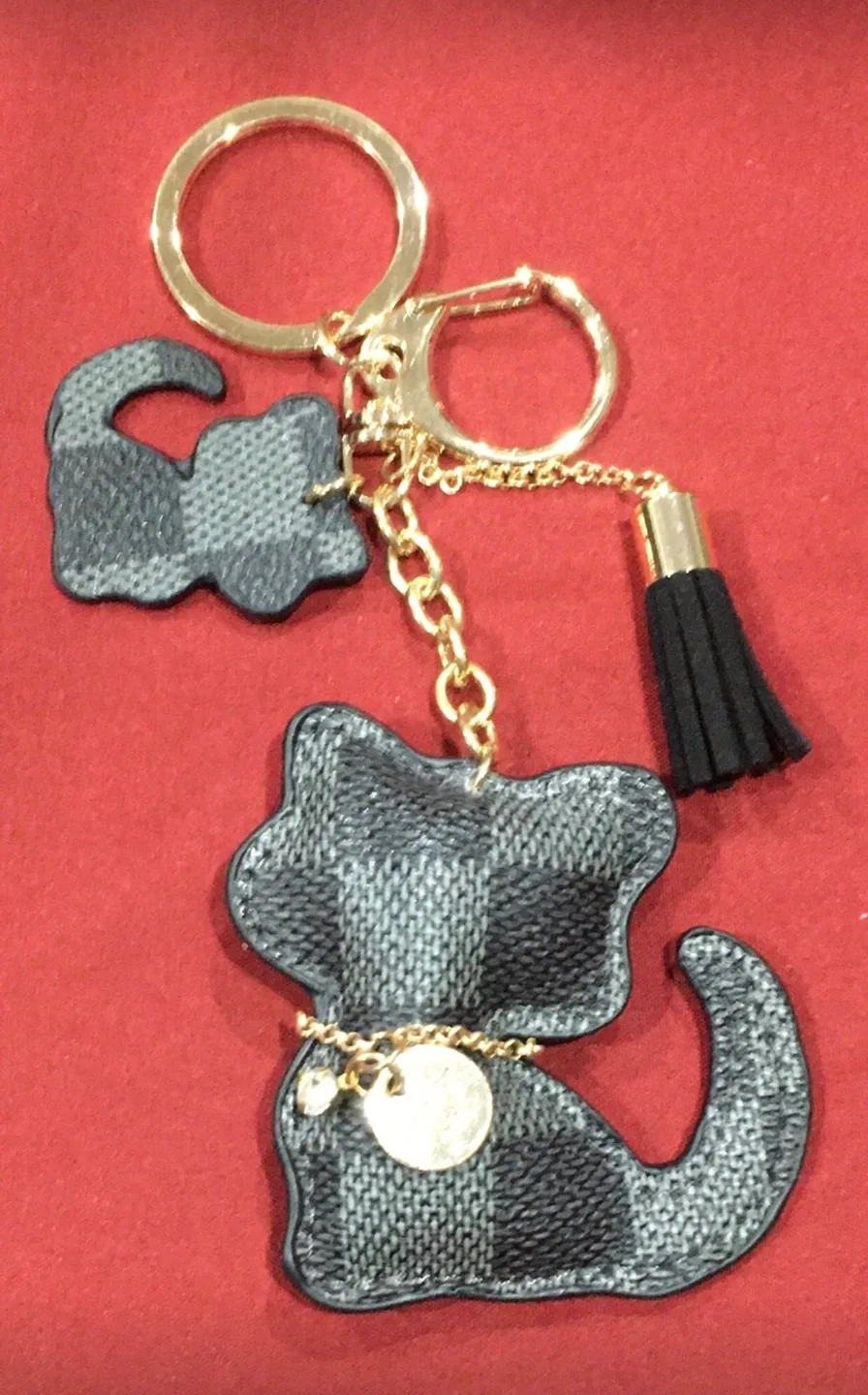 Adorable Cat Keychain with Tassel image indicator(2)