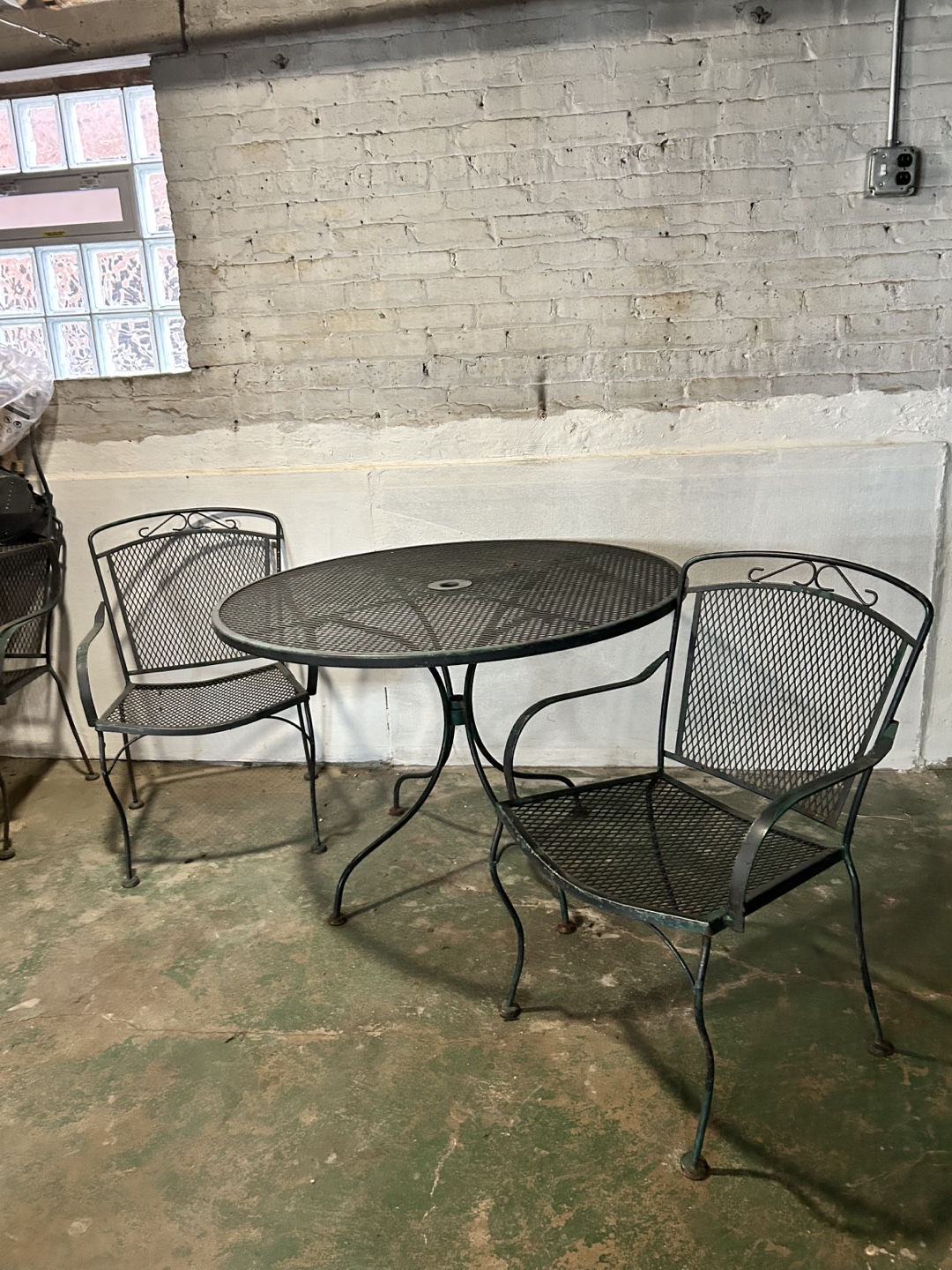 Wrought iron patio set with four chairs