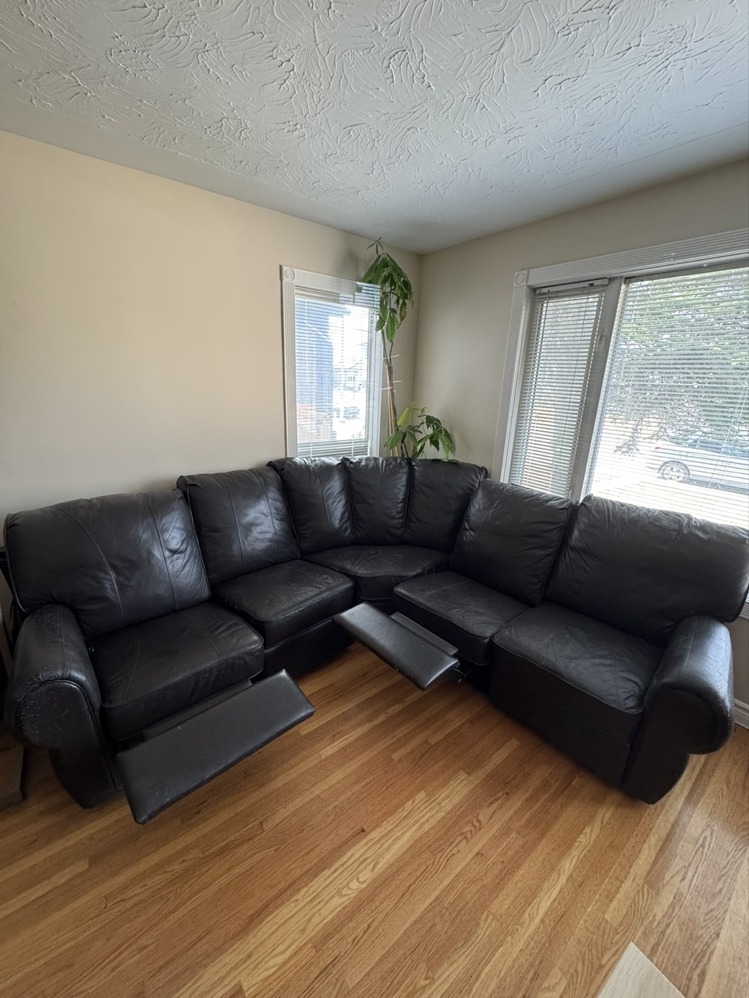 Used Black Leather Recliner Sectional - photo 2