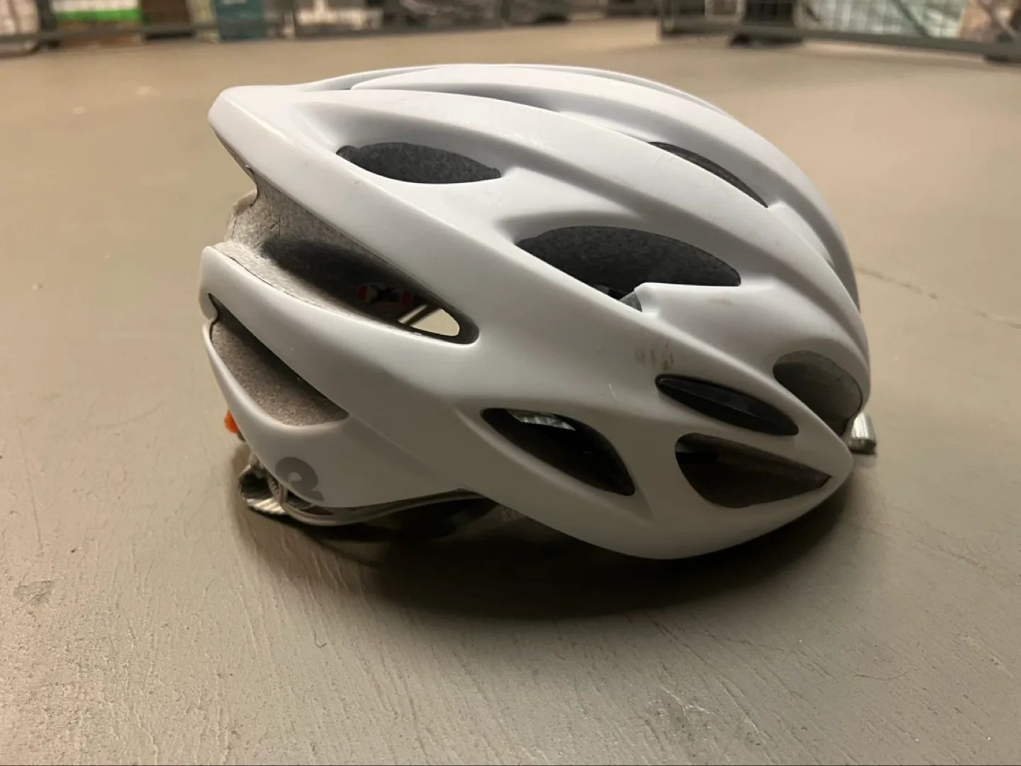 White Cycling Helmet and Bike Repair Kit thumbnail