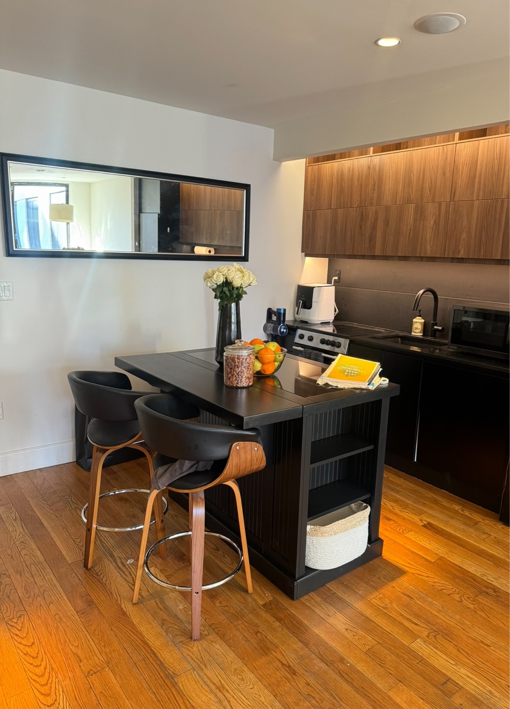 Black Kitchen Island with granite Top and Storage on all sides