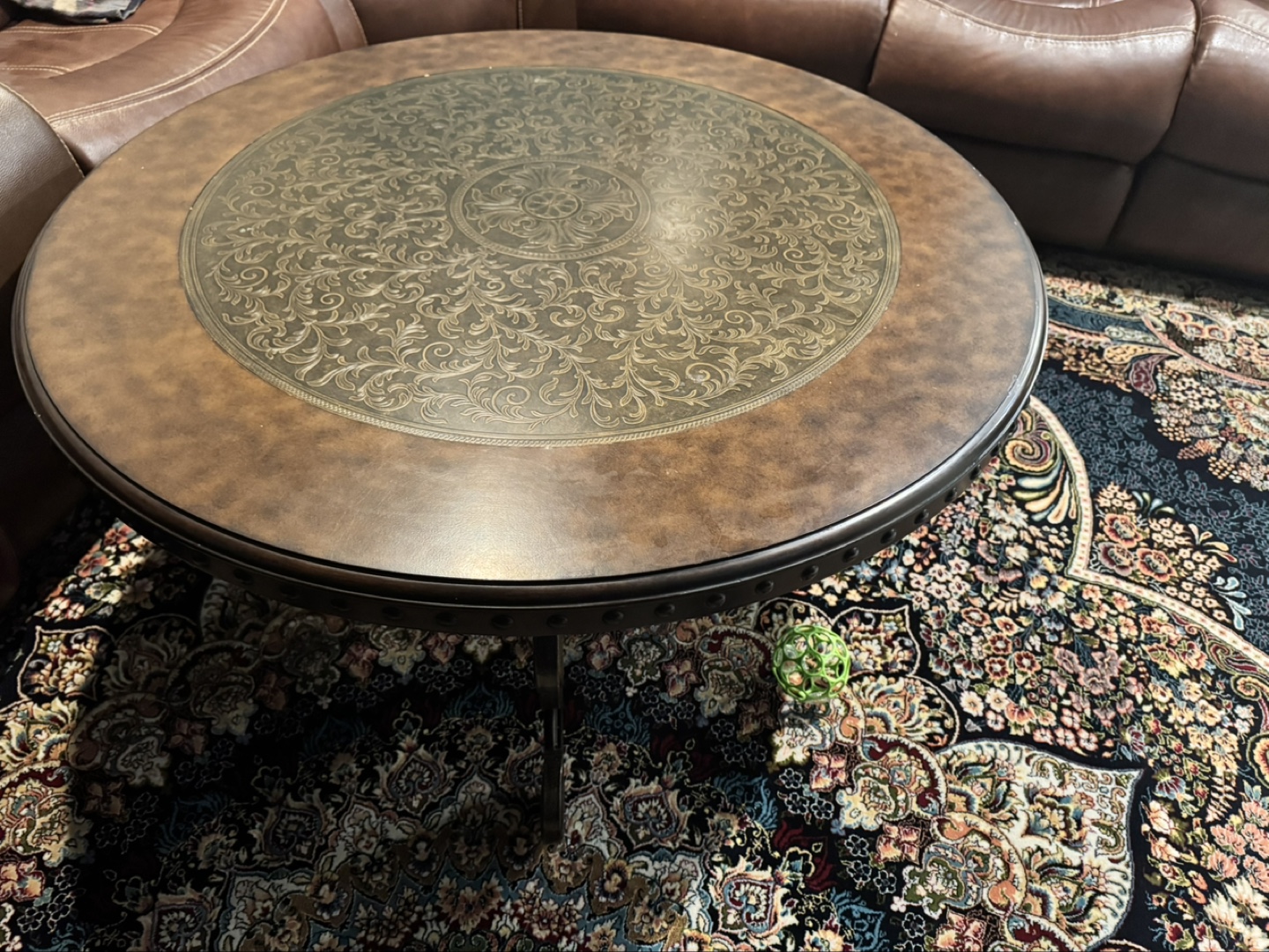 Round Coffee Table with Intricate Design