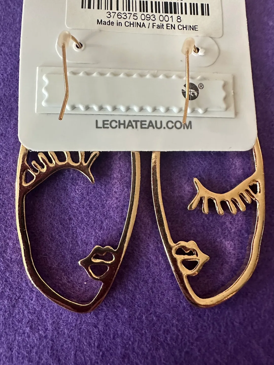 Le Chateau Gold Tone Face Earrings image indicator(2)