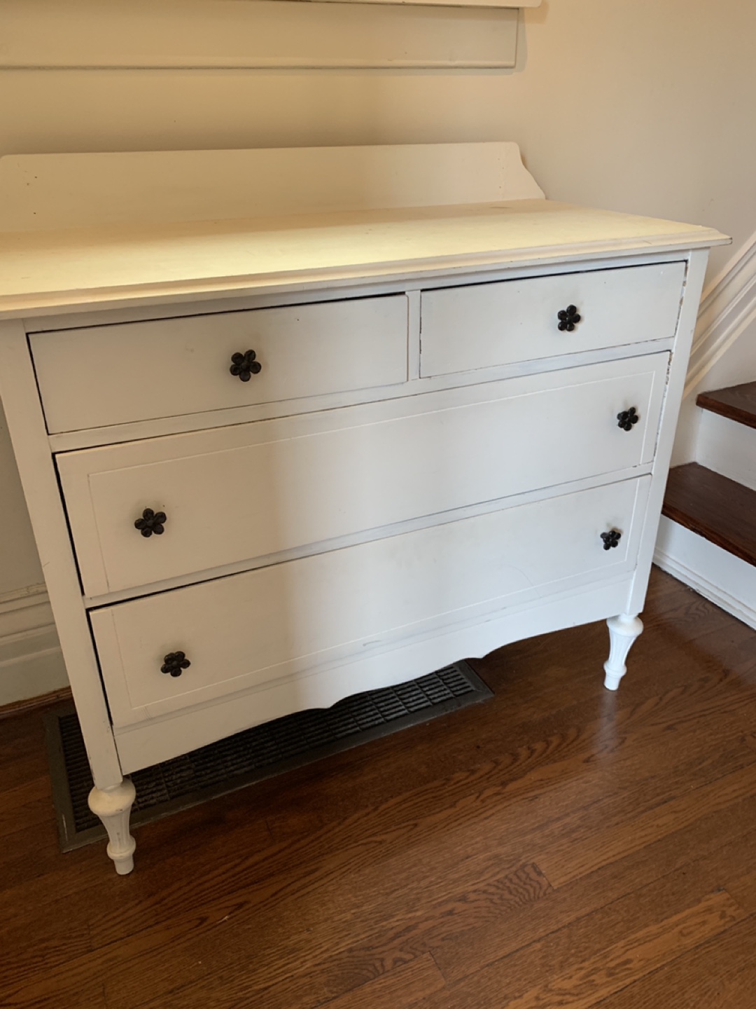 White Four-Drawer Dresser with Flower Knobs