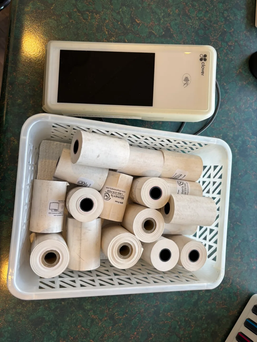 Clover Mini POS terminal and thermal paper rolls thumbnail