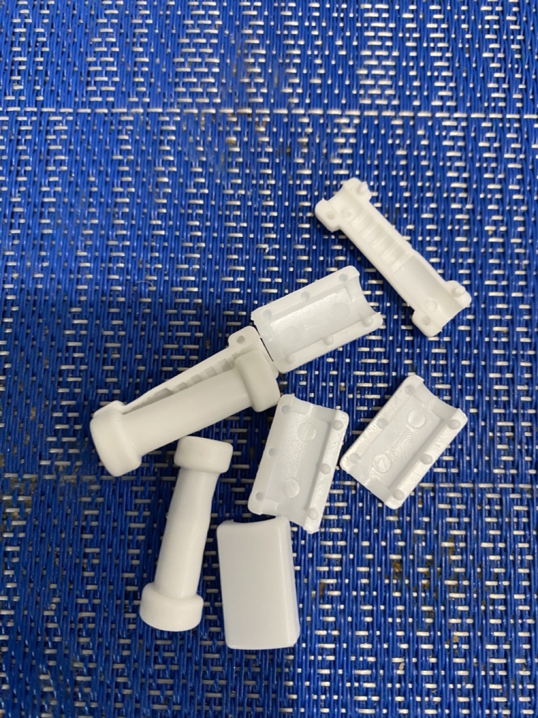 White Plastic Parts - Possible Appliance Repair Kit