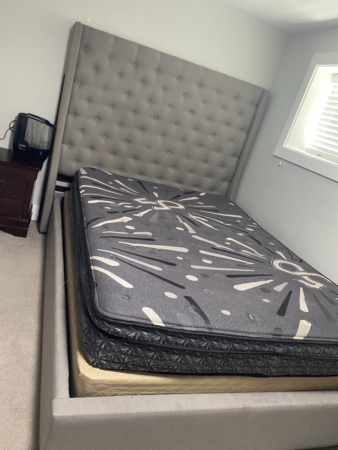 Queen-size bed frame and mattress