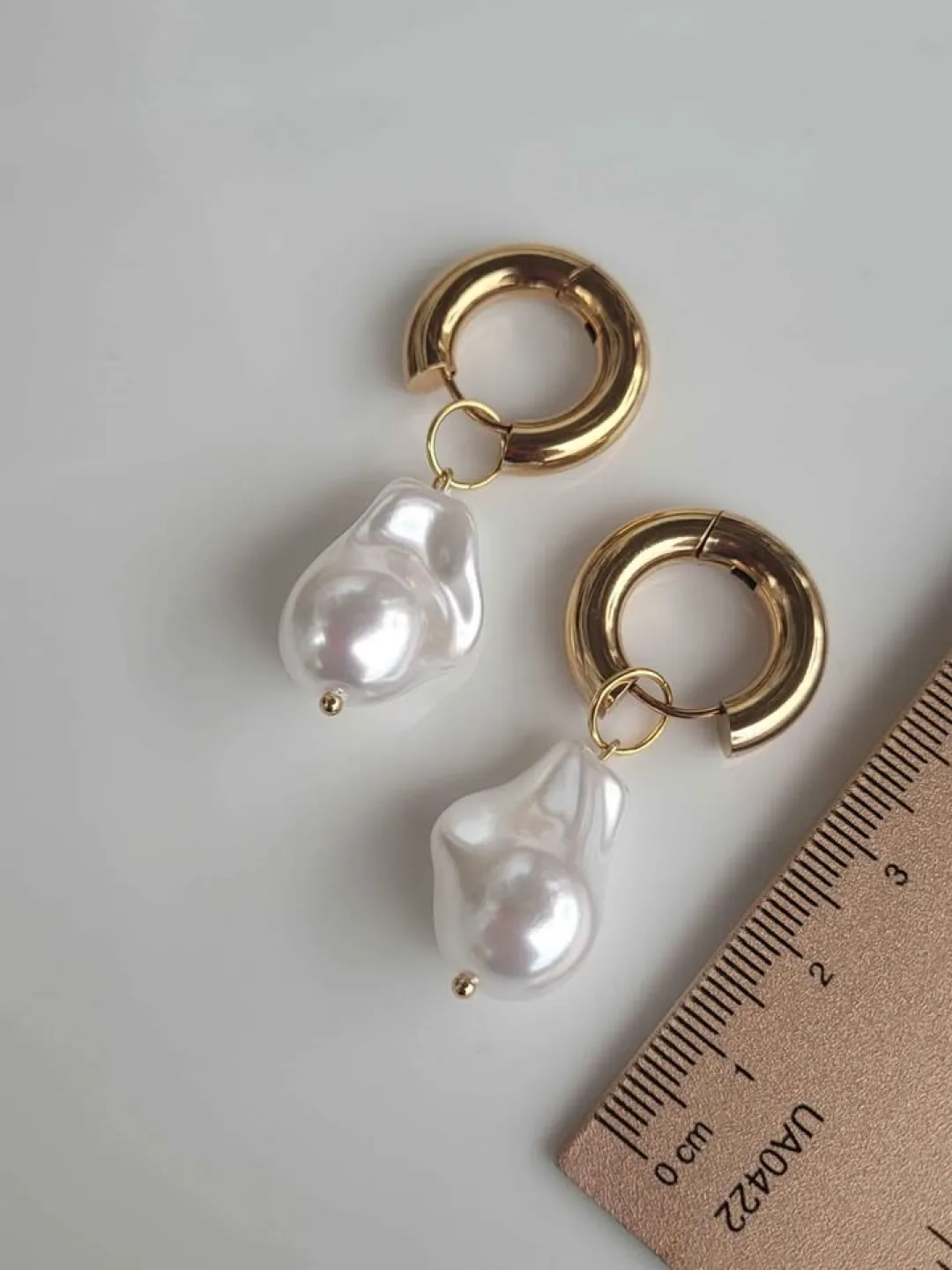 Stainless steel gold and pearl earrings image indicator(2)