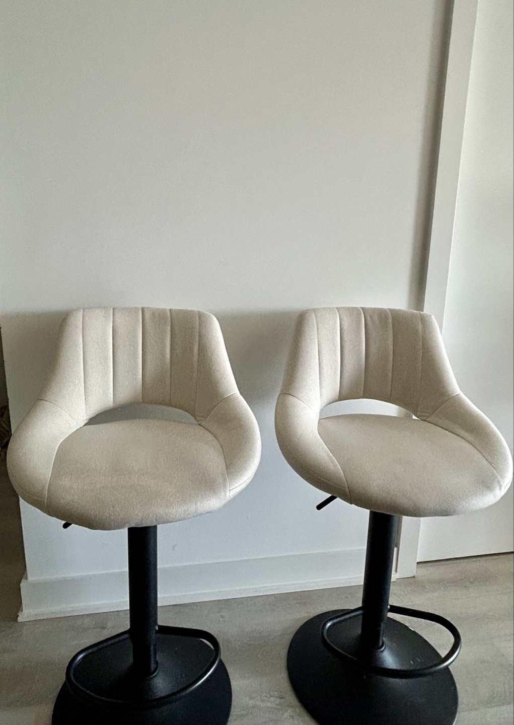Pair of Beige Swivel Bar Stools